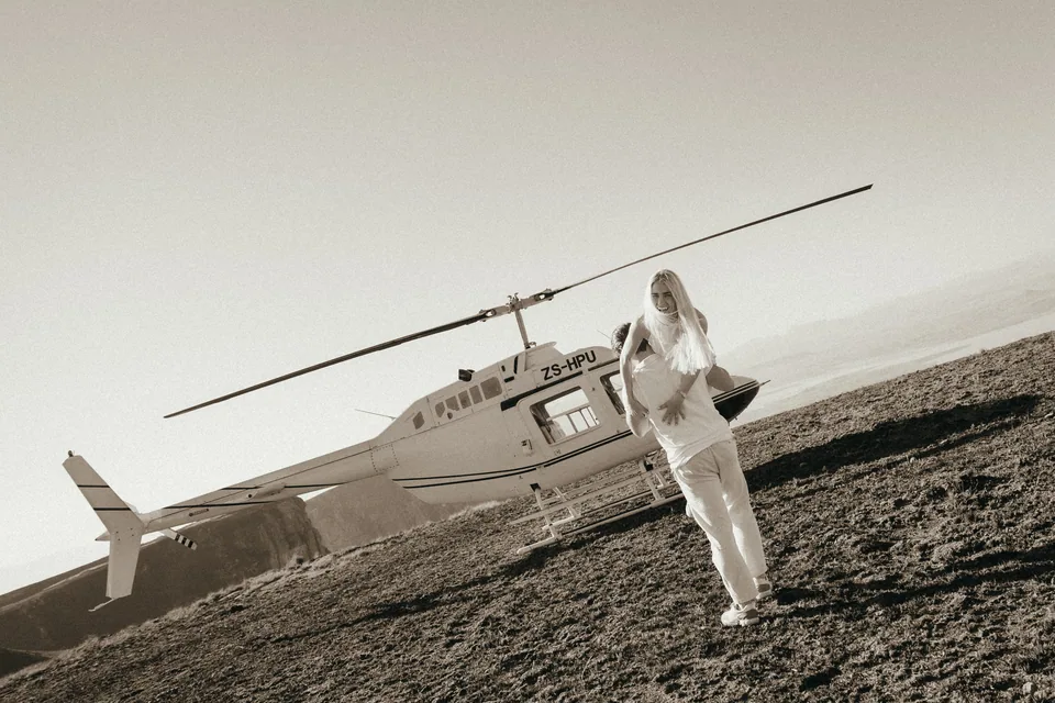 Christy walking back towards the helicopter