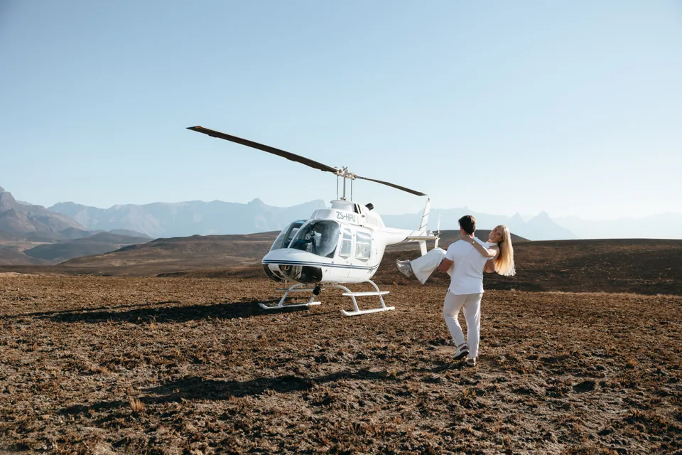 Joshua walking out to the waiting helicopter