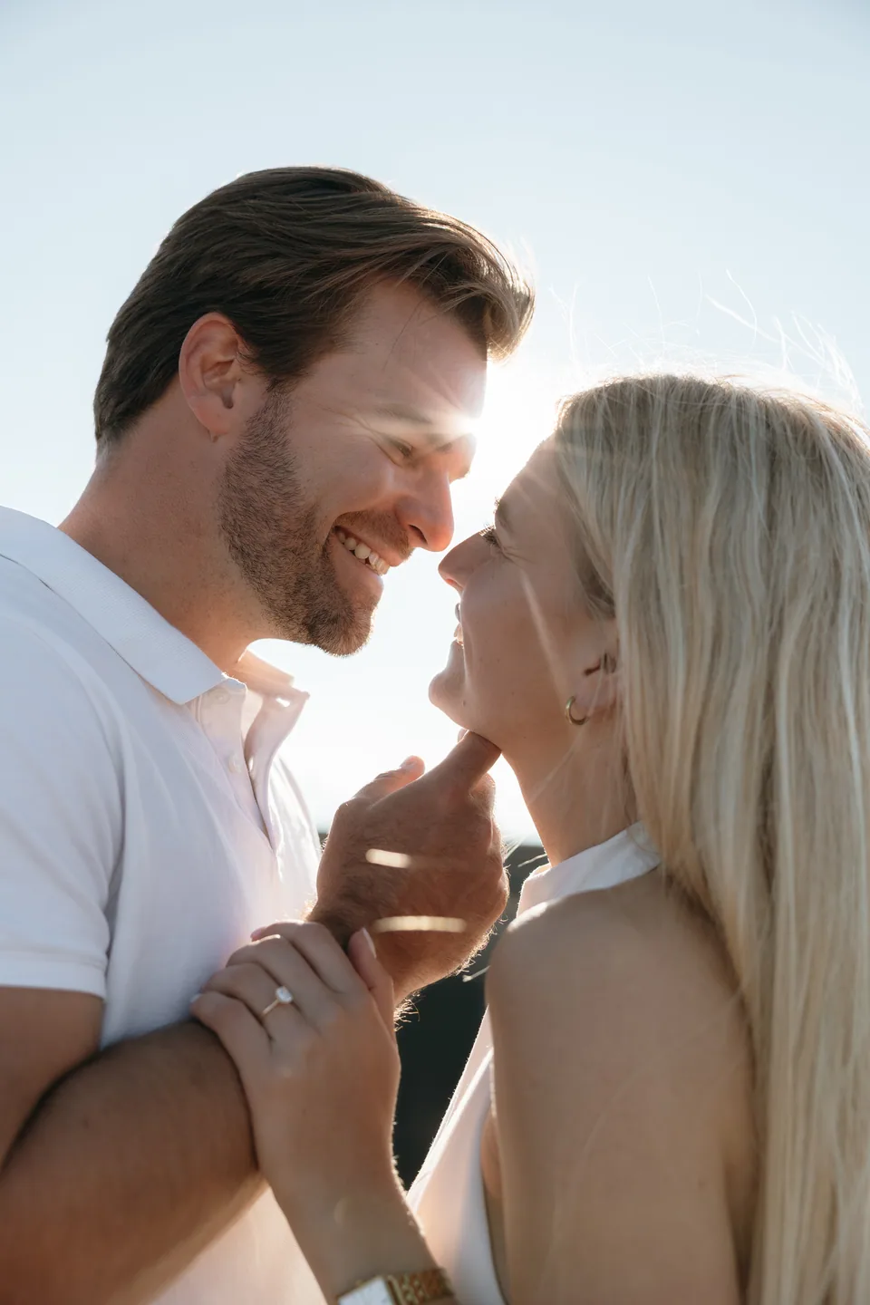 Close and laughing, foreheads touching